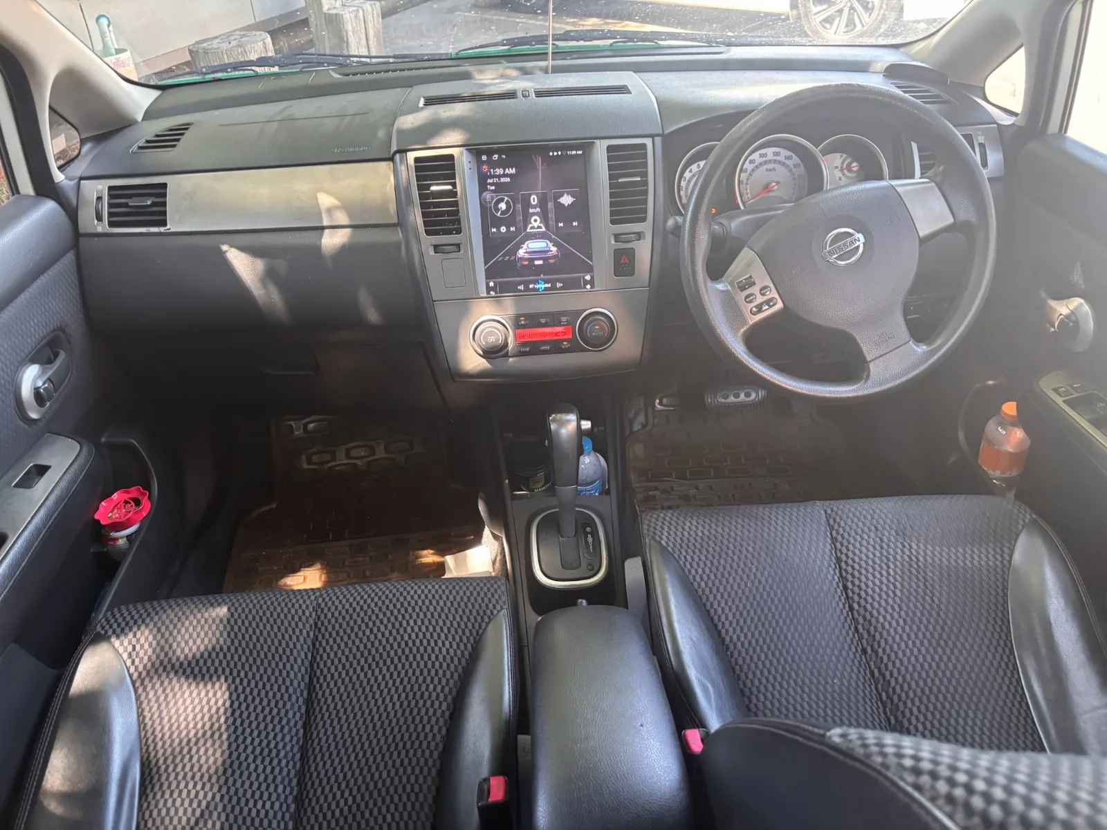 NISSAN Tiida — 6
